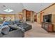 Spacious living room features a stone fireplace and vaulted ceilings with skylights at 2701 East Mill Sw Way, Conyers, GA 30094