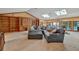 Large living room featuring skylights, built-in bookshelves, and French doors to the patio at 2701 East Mill Sw Way, Conyers, GA 30094