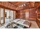 Wood clad home spa featuring a large jacuzzi, tile flooring and access to the main bath at 2701 East Mill Sw Way, Conyers, GA 30094