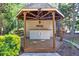 Tiki bar with seating and decor in backyard at 2701 East Mill Sw Way, Conyers, GA 30094