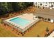 A lovely community pool provides residents a cool retreat, complemented by manicured grounds and a clubhouse at 3764 Sage Park Way, Suwanee, GA 30024