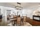 Modern dining area with stylish lighting and views into the living room at 920 Memorial Se Dr # 44, Atlanta, GA 30316