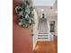 Inviting entryway with stylish flooring, staircase, and elegant accents at 920 Memorial Se Dr # 44, Atlanta, GA 30316