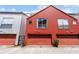 Contemporary townhomes showcasing a colorful facade, garages, and sleek window designs at 920 Memorial Se Dr # 44, Atlanta, GA 30316