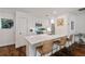 Open kitchen featuring a breakfast bar with marble countertops and seating for three at 920 Memorial Se Dr # 44, Atlanta, GA 30316