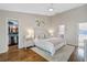 Comfortable main bedroom with a walk-in closet and ensuite bath at 920 Memorial Se Dr # 44, Atlanta, GA 30316