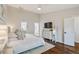 Well-lit main bedroom with hardwood floors, ensuite bath and walk-in closet at 920 Memorial Se Dr # 44, Atlanta, GA 30316