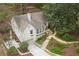 Aerial view of the home featuring landscaped yard and driveway at 1794 Charline Ne Ave, Atlanta, GA 30306