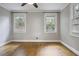 Cozy bedroom features hardwood floors, neutral paint, crown molding, and ample natural light at 1794 Charline Ne Ave, Atlanta, GA 30306