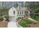 Charming white brick home with a well-manicured front yard at 1794 Charline Ne Ave, Atlanta, GA 30306
