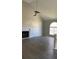 Bright living room with fireplace, vaulted ceiling, and large window at 2250 Camp Town Way, Lawrenceville, GA 30044