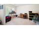 Bright bedroom with natural light, a workstation by the window, and carpeted floors at 3225 Warren Creek Sw Dr, Hiram, GA 30141