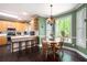 Charming kitchen with hardwood floors, stainless steel appliances, and a breakfast bar at 3225 Warren Creek Sw Dr, Hiram, GA 30141