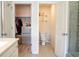 This bathroom is attached to a walk-in closet and toilet room at 4125 Hidden River Dr, Cumming, GA 30028