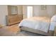 Bedroom features a light and airy color scheme with lots of natural light at 4125 Hidden River Dr, Cumming, GA 30028