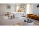 Beautiful bedroom features a king size bed and lovely seating area at 4125 Hidden River Dr, Cumming, GA 30028