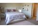 Bright bedroom featuring a full size bed with comfortable pillows and carpeted floor at 4125 Hidden River Dr, Cumming, GA 30028