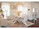 Stylish dining room with white chairs and modern lighting fixtures at 4125 Hidden River Dr, Cumming, GA 30028