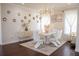 Modern dining room with a long white table and decorative mirrors at 4125 Hidden River Dr, Cumming, GA 30028