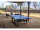 Outdoor patio with ping pong table, basketball hoop and comfortable seating arrangement at 4125 Hidden River Dr, Cumming, GA 30028