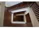 Staircase with white railing and dark wood steps and landing viewed from above at 4125 Hidden River Dr, Cumming, GA 30028