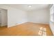 Well-lit bedroom with hardwood floors and ample space, perfect for relaxation at 112 Bernice Dr, Lawrenceville, GA 30045