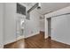 Hallway area leads to a bathroom with sliding closet doors and updated lighting at 172 Haynes Sw St # 108, Atlanta, GA 30313