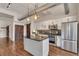 Modern kitchen with stainless steel appliances, granite countertops, and a stylish island at 172 Haynes Sw St # 108, Atlanta, GA 30313