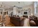 Cozy living room with wood floors, sofas, exposed ductwork, and a chef's kitchen at 172 Haynes Sw St # 108, Atlanta, GA 30313