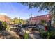 Spacious outdoor patio with seating, grilling area, and views of the surrounding buildings at 172 Haynes Sw St # 108, Atlanta, GA 30313