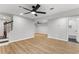 Large finished basement offers versatile space with a modern bath and stairway to the first floor at 2318 Plantation Dr, Atlanta, GA 30344