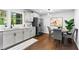 Updated kitchen featuring granite counters, stainless appliances, and a breakfast nook at 2318 Plantation Dr, Atlanta, GA 30344