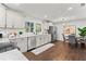 Updated kitchen featuring granite counters, stainless appliances, and a breakfast nook at 2318 Plantation Dr, Atlanta, GA 30344