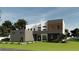 Modern two-story home showcasing unique architectural design and manicured front lawn at 360 Campground Road, Mcdonough, GA 30253
