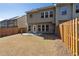 Secluded backyard with a wooden fence and a well-manicured lawn, providing a private outdoor retreat at 6160 Shiloh Woods Dr, Cumming, GA 30040