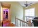 Bright entryway with hardwood floors, and a large window above the door letting in ample natural light at 990 Fox Valley Trl, Stone Mountain, GA 30088