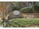 Stone Crofton community sign surrounded by lush greenery, creating a welcoming and upscale entrance at 1110 Croftmoore Lndg, Suwanee, GA 30024