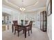 Bright dining room with bay windows and an open connection to foyer at 1110 Croftmoore Lndg, Suwanee, GA 30024