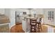 Contemporary kitchen with an island breakfast bar and modern finishes at 1110 Croftmoore Lndg, Suwanee, GA 30024