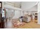 Spacious living room featuring hardwood floors, a fireplace, and an open floor plan at 1110 Croftmoore Lndg, Suwanee, GA 30024