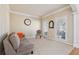 This is a cozy living room with neutral carpet, offering a comfortable and inviting space for relaxation at 1110 Croftmoore Lndg, Suwanee, GA 30024
