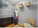 Walk-in closet featuring shelving, storage, and cabinet at 1110 Croftmoore Lndg, Suwanee, GA 30024