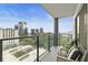 City view from the balcony with outdoor seating, offering a tranquil escape and scenic views at 1280 W Peachtree Nw St # 1712, Atlanta, GA 30309
