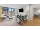 The open-concept living area showcases views, stylish dining area, and a versatile layout at 1280 W Peachtree Nw St # 1712, Atlanta, GA 30309