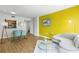 Open-concept living space features stylish decor, a dining area, and a view into the kitchen at 1280 W Peachtree Nw St # 1712, Atlanta, GA 30309