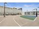 Modern outdoor space with a basketball court, grill, and dining area for residents' enjoyment at 1280 W Peachtree Nw St # 1712, Atlanta, GA 30309