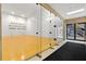 Racquetball court featuring a glass-enclosed viewing area and clear rules for court usage at 1280 W Peachtree Nw St # 1712, Atlanta, GA 30309