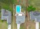 Overhead aerial shot of a home featuring a refreshing swimming pool and a well-maintained backyard at 2061 Emerald Dr, Loganville, GA 30052