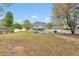 Spacious backyard featuring a refreshing in-ground pool, lounge chairs, and privacy fence at 2061 Emerald Dr, Loganville, GA 30052