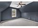 Attic bedroom with vaulted ceilings and a ceiling fan at 2061 Emerald Dr, Loganville, GA 30052